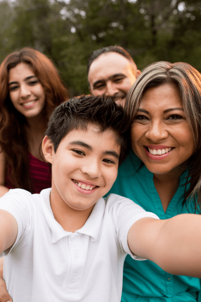 Family spending time together, supporting each other while building positive body image and self-esteem.