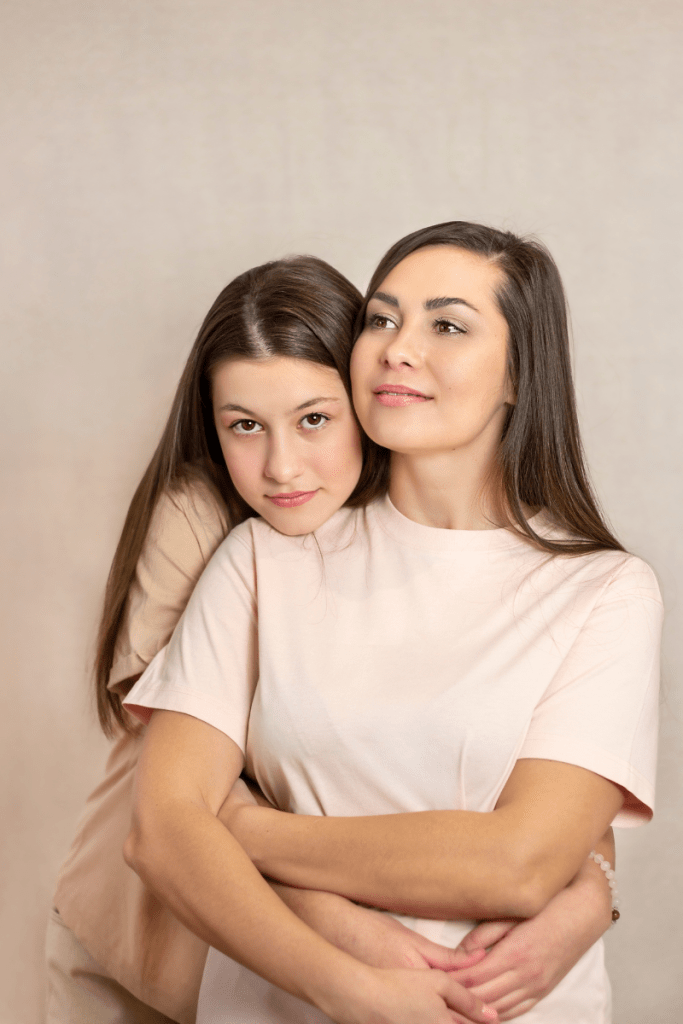 Mother supporting her teen daughter during eating disorder recovery, showing connection and encouragement.